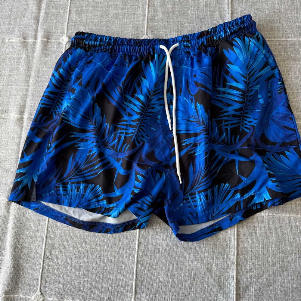 Blue Palm Print Swim Trunks